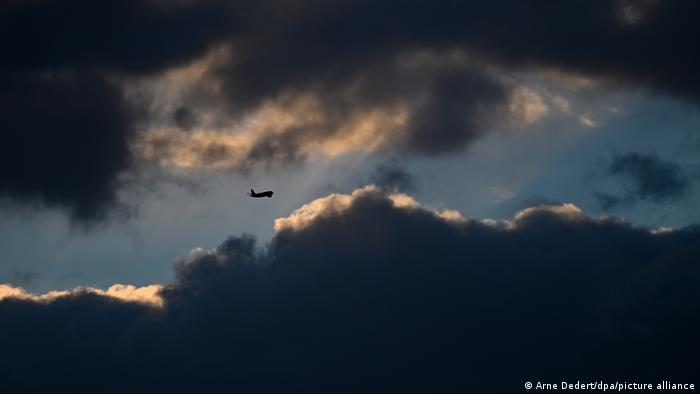 Storm clouds with an airplane 