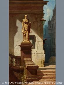 'Justitsia' features a golden statue on a staircase.