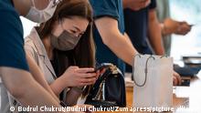 September 24, 2021, Hong Kong, China: Shoppers are seen purchasing Apple brand products at an Apple store during the launch day of the new iPhone 13 series smartphones in Hong Kong. (Credit Image: © Budrul Chukrut/SOPA Images via ZUMA Press Wire