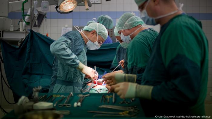 Surgeons during a kidney transplant surgery