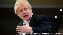 Britain's Prime Minister Boris Johnson speaks during the Munich Security Conference in Munich, Germany, Saturday, Feb. 19, 2022. (AP Photo/Matt Dunham, Pool)