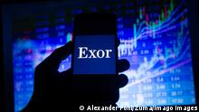November 10, 2018 - Milan, Lombardy, Italy - The logo of the Italian company Exor listed in the MIB in Milan is seen on a screen. In the background there is a colorful stock exchange price performance. Milan Italy PUBLICATIONxINxGERxSUIxAUTxONLY - ZUMAn230 20181110_zaa_n230_020 Copyright: xAlexanderxPohlx