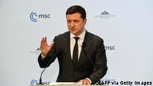 Ukrainian President Volodymyr Zelensky speaks at the Munich Security Conference (MSC) in Munich, southern Germany, on February 19, 2022. - During the 58th Munich Security Conference running from February 18-20, 2022, international diplomats and experts meet to discuss topics such as global order, human and transnational security, defense or sustainability. (Photo by Thomas KIENZLE / AFP) (Photo by THOMAS KIENZLE/AFP via Getty Images)