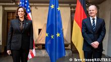 German Chancellor Olaf Scholz meets U.S. Vice President Kamala Harris during the annual Munich Security Conference, in Munich, Germany February 19, 2022. Sven Hoppe/Pool via REUTERS