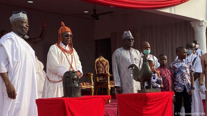 Oba Ewuare II, king of the local Edo people, receives two stolen Benin artifacts back in Benin City, Nigeria