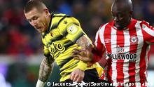 London, England, 10th December 2021. Juraj Kucka of Watford FC battles for possession with Yoane Wissa of Brentford during the Premier League match at Brentford Community Stadium, London. Picture credit should read: Jacques Feeney / Sportimage PUBLICATIONxNOTxINxUK SPI-1392-0058 