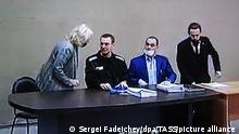VLADIMIR REGION, RUSSIA - FEBRUARY 21, 2022: Pictured in this image is a monitor showing opposition activist Alexei Navalny (2nd L) and his lawyer Olga Mikhailova (L) during an on-site Lefortovo District Court hearing against Navalny at Penal Colony No 2 in Pokrov, Vladimir Region. Navalny is facing charges of contempt of court (in connection with his trial for defaming a WWII veteran) and large scale fraud. Sergei Fadeichev/TASS