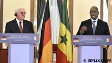 German President Frank-Walter Steinmeier is seen at a joint press conference with his Senegalese counterpart Macky Sall after an audience at the Palace of the Republic in Dakar on February 21, 2022. - African countries need European and German forces in Mali and the Sahel for the anti-jihadist fight, Senegalese President Macky Sall said Monday in Dakar during a joint press conference with his German counterpart. (Photo by SEYLLOU / AFP)