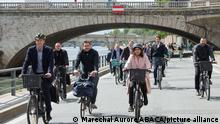 Christian Prudhomme, Olivier Schneider and Mayor of Paris Anne Hidalgo are seen riding bicycles as the city of Paris obtains the Label 'Ville A Velo du Tour de France' (Tour de France Cycle City) in Paris, France, on May 21, 2021. Photo by Aurore Marechal/ABACAPRESS.COM