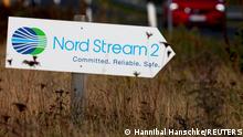 ARCHIV 2020 *** FILE PHOTO: A road sign directs traffic towards the Nord Stream 2 gas line landfall facility entrance in Lubmin, Germany, September 10, 2020. REUTERS/Hannibal Hanschke//File Photo