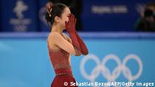 China's Zhu Yi reacts crying after competing in the women's single skating free skating of the figure skating team event during the Beijing 2022 Winter Olympic Games at the Capital Indoor Stadium in Beijing on February 7, 2022. (Photo by SEBASTIEN BOZON / AFP) (Photo by SEBASTIEN BOZON/AFP via Getty Images)