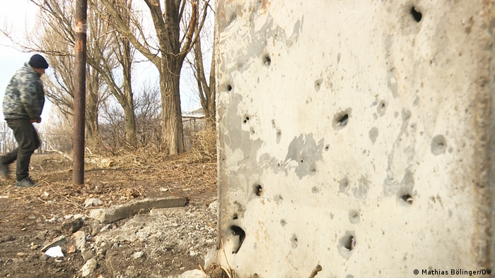 A wall with bullet holes in Vrubivka 