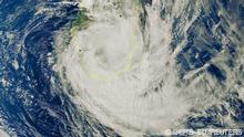 A satellite image shows Cyclone Emnati over Madagascar, February 23, 2022. Courtesy of European Union, Copernicus Sentinel-3. Imagery processed by @DEFIS_EU/Handout via REUTERS THIS IMAGE HAS BEEN SUPPLIED BY A THIRD PARTY. MANDATORY CREDIT