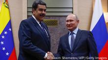 Vladimir Putin and Nicolas Maduro