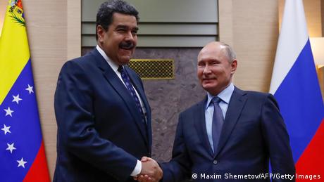 Vladimir Putin and Nicolas Maduro