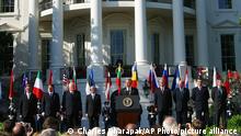 President Bush, center, welcomes the seven former Soviet Bloc nations to NATO membership during a ceremony on the South Lawn of the White House Monday, March 29, 2004 in Washington. Prime Ministers with Bush are, from left to right, Indulis Emsis of Latvia, Anton Rop of Slovenia, Algirdas Brazauskas of Lithuania, Mikulas Dzurinda of Slovakia, Adrian Nastase of Romania, Simeon Saxe-Coburg Gotha of Bulgaria, Juhan Parts of Estonia, and NATO Secretary-General Jaap de Hoop Scheffer. (AP Photo/Charles Dharapak)