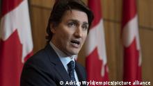 THE CANADIAN PRESS 2022-02-23. Canadian Prime Minister Justin Trudeau responds to a question during a news conference, Wednesday, Feb. 23, 2022 in Ottawa. THE CANADIAN PRESS/Adrian Wyld URN:65490406
