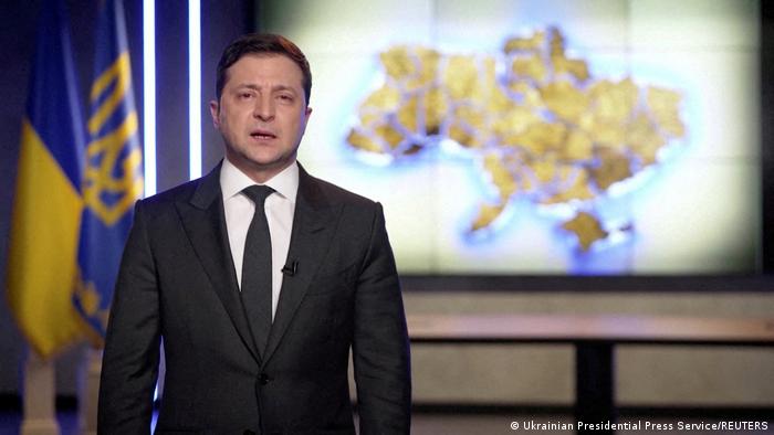 Zelenskyy giving an address on television