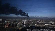 Ukraine Konflikt | Rauchwolke über Militärflughafen in Chuguyev
