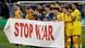 Barcelona and Napoli players hold up a "Stop War" banner Barcelona and Napoli players hold up a "Stop War" banner