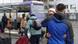 A Ukrainian couple hug at a street after deciding to leave Lviv, western Ukraine for Poland A Ukrainian couple hug at a street after deciding to leave Lviv, western Ukraine for Poland