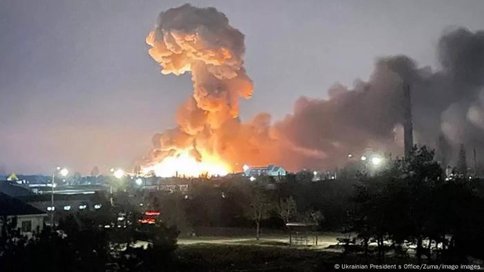 A massive explosion seen against the skyline of Kyiv on the morning of February 25