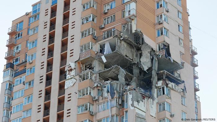 An apartment block with a hole in the side