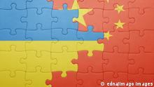puzzle with the national flag of ukraine and china. concept