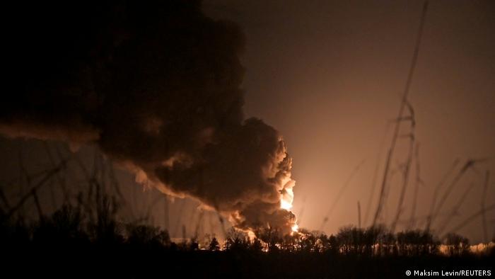 Fire and smoke emerge from a natural gas depot just outside Kyiv on February 27.