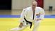 Vladimir Putin stretching in a judo outfit Vladimir Putin stretching in a judo outfit