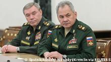 Russian Defence Minister Sergei Shoigu and Chief of the General Staff of Russian Armed Forces Valery Gerasimov attend a meeting with Russian President Vladimir Putin in Moscow, Russia February 27, 2022. Sputnik/Aleksey Nikolskyi/Kremlin via REUTERS ATTENTION EDITORS - THIS IMAGE WAS PROVIDED BY A THIRD PARTY.