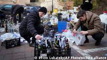 People in Kyiv making Molotov cocktails