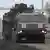 Российский военный грузовик перевозит самоходную пушку 2С7 "Пион" под Белгородом на границе с Украиной, февраль 2022 года