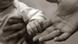 A baby grabbing an adult's finger A baby grabbing an adult's finger