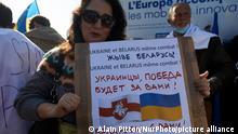 A woman holds a placard reading 'Ukraine and Belarus same fight'. Thousands of people marched in Toulouse against the war waged by Russian President Vladimir Putin against Ukraine less than a week after the offensve begun. Ukrainians were numerous as Toulouse has an important community of Ukrainians. Toulouse is twined with Kiev. France has closed its airspace to russian aircrafts and Russia is gradually cut off the SWIFT bank system. Putin has said he has put his nuclear defensive forces on high alert. Toulouse. France. February 27th 2021. (Photo by Alain Pitton/NurPhoto)