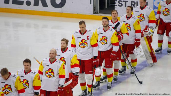 Players from Finnish side Jokerit standing on the blue line