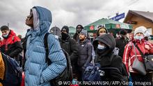 Refugees from Africa, the Middle East and India at the Medyka border crossing in Poland