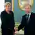 Marine Le Pen e Vladimir Putin apertam-se as mãos