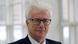 Author Ken Follett looking at the camera and wearing glasses. Author Ken Follett looking at the camera and wearing glasses.