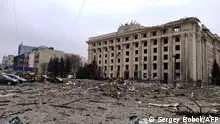 This general view shows the damaged local city hall of Kharkiv on March 1, 2022, destroyed as a result of Russian troop shelling. - The central square of Ukraine's second city, Kharkiv, was shelled by advancing Russian forces who hit the building of the local administration, regional governor Oleg Sinegubov said. Kharkiv, a largely Russian-speaking city near the Russian border, has a population of around 1.4 million. (Photo by Sergey BOBOK / AFP)