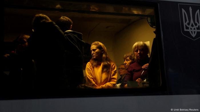 People are seen in an evacuation train from Kyiv to Lviv, at Kyiv central train station following Russia's invasion of Ukraine, in Kyiv, Ukraine March 1, 2022.