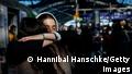 Two women hug each other deeply after refugees from the Ukraine arrive at the main train station on March 1, 2022, in Berlin, Germany