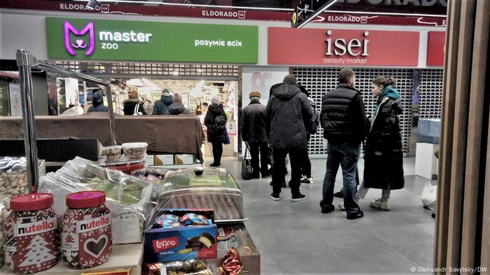 A queue outside of a store in Kyiv