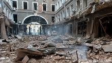 A picture shows damages in a building entrance after the shelling by Russian forces of Constitution Square in Kharkiv, Ukraine's second-biggest city, on March 2, 2022. - On the seventh day of fighting in Ukraine on March 2, Russia claims control of the southern port city of Kherson, street battles rage in Ukraine's second-biggest city Kharkiv, and Kyiv braces for a feared Russian assault. (Photo by Sergey BOBOK / AFP)