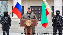 [DIESES FOTO WIRD VON DER RUSSISCHEN STAATSAGENTUR TASS ZUR VERFÜGUNG GESTELLT] GROZNY, CHECHEN REPUBLIC, RUSSIA - FEBRUARY 25, 2022: Ramzan Kadyrov (C), head of the Chechen Republic, takes part in a review of the Chechen Republic's troops and military hardware at the residence of Ramzan Kadyrov, head of the Chechen Republic. Early on 24 February, Russia's President Putin announced his decision to launch a special military operation after considering requests from the leaders of the Donetsk People's Republic and Lugansk People's Republic. Yelena Afonina/TASS