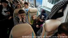 03.03.2022
A woman uses her mobile phone after boarding a bus which will take refugees to Germany, at the train station in Przemysl, Poland, Thursday, March 3, 2022. More than 1 million people have fled Ukraine following Russia's invasion in the swiftest refugee exodus in this century, the United Nations said Thursday. (AP Photo/Markus Schreiber)
