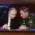 अपने फर्स्ट डिप्टी रक्षा मंत्री वैलरी जेरासिमोव के साथ रूसी राष्ट्रपति व्लादिमीर पुतिन (बाएं)
