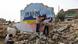 Syrian artists Aziz Asmar and Anis Hamdoun paint a mural amid the destruction, depicting the colours of the Russian and Ukrainian flags, to protest against Russia's military operation in Ukraine, . Syrian artists Aziz Asmar and Anis Hamdoun paint a mural amid the destruction, depicting the colours of the Russian and Ukrainian flags, to protest against Russia's military operation in Ukraine, .