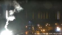 Surveillance camera footage shows a flare landing at the Zaporizhzhia nuclear power plant during shelling in Enerhodar, Zaporizhia Oblast, Ukraine March 4, 2022, in this screengrab from a video obtained from social media. Zaporizhzhya NPP via YouTube/via REUTERS THIS IMAGE HAS BEEN SUPPLIED BY A THIRD PARTY. MANDATORY CREDIT. NO RESALES. NO ARCHIVES. REFILE - ADDITIONAL CAPTION INFORMATION