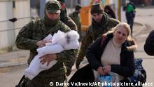 04.03.2022
People fleeing from Ukraine are helped by Slovakia's army soldiers to cross the border in Vysne Nemecke, Slovakia, Friday, March 4, 2022. More than 1 million people have fled Ukraine following Russia's invasion in the swiftest refugee exodus in this century, the United Nations said Thursday. (AP Photo/Darko Vojinovic)